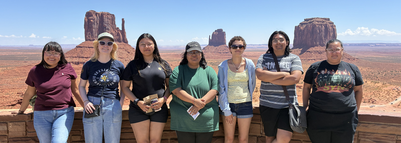 Group of TRIO students standing in front of an overlook.